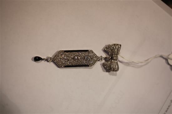 An attractive 1920s Cartier, platinum, diamond and black onyx drop pendant, pendant 2.75in excl. bale